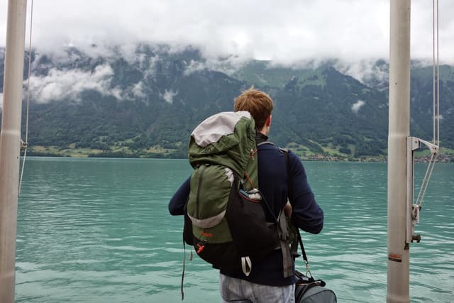 JC Zabel looking out over an alpine lake