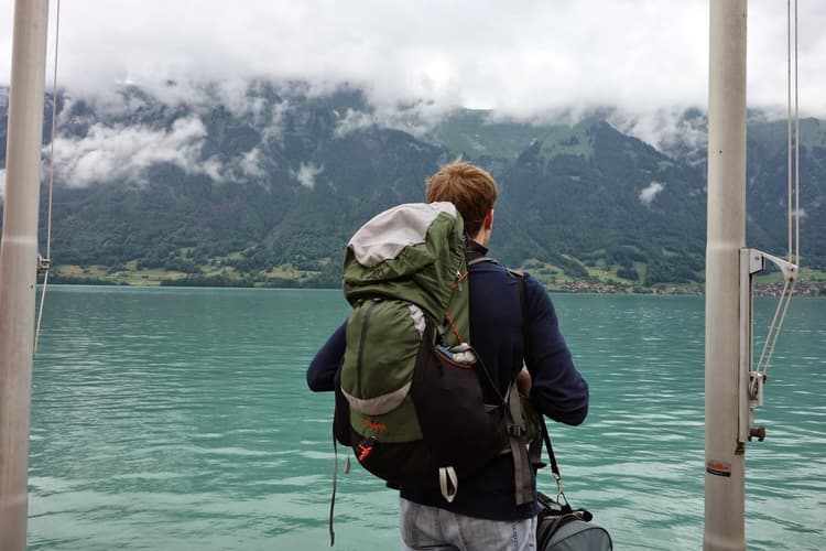 JC Zabel looking out over an alpine lake
